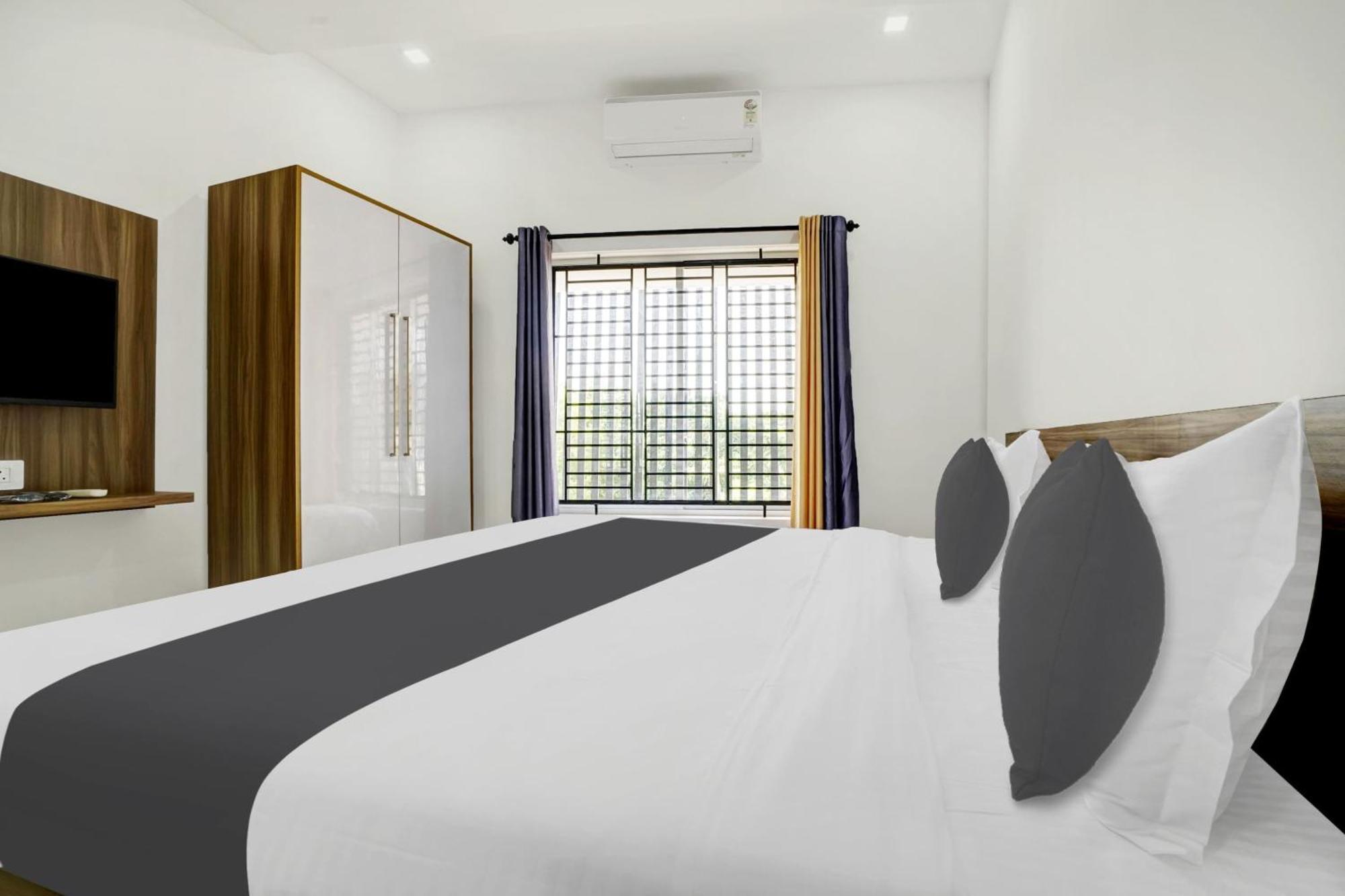 Pāppinisseri Hotel O Grand Parassini מראה חיצוני תמונה